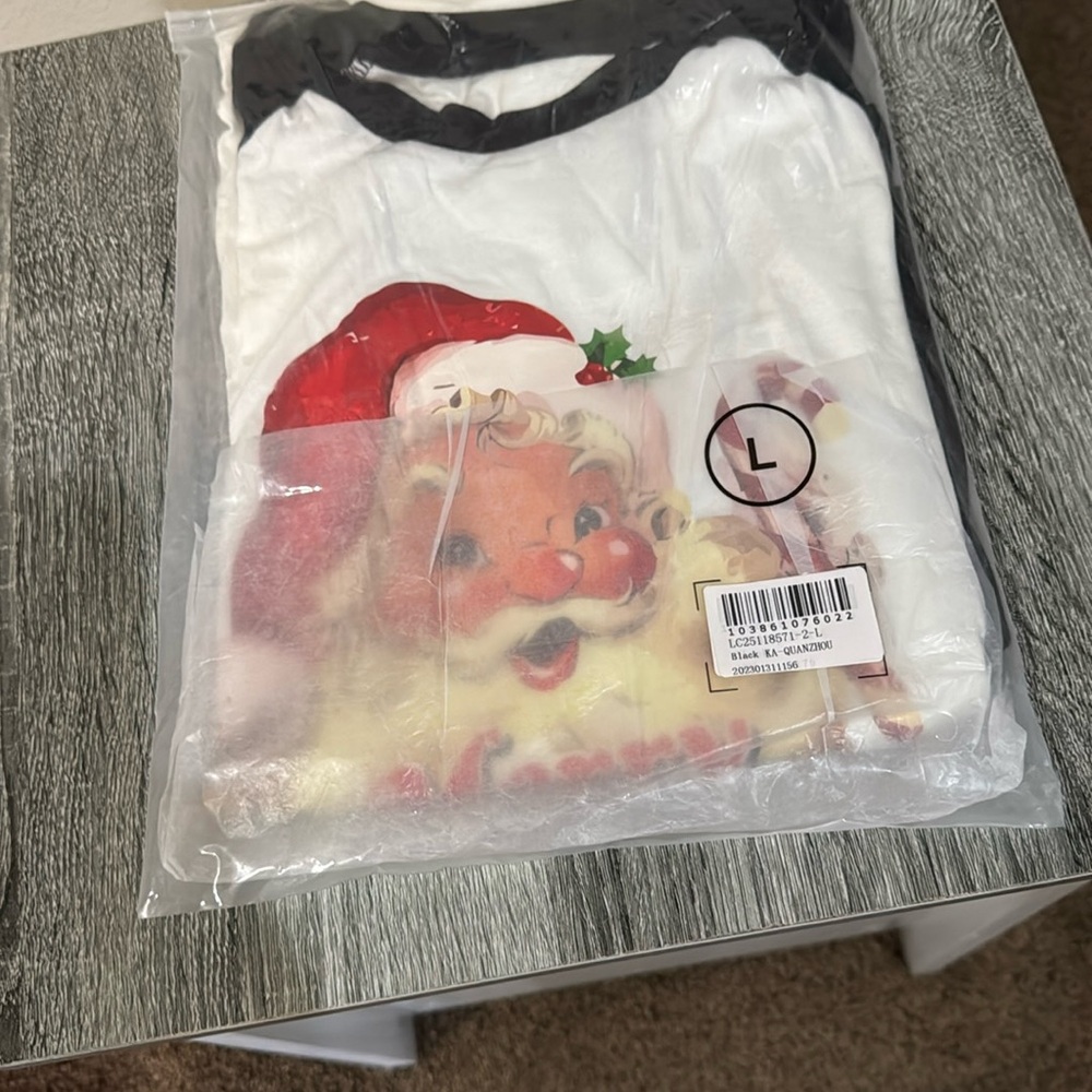 Brand new women’s size L baseball shirt Santa-see all matching in my closet